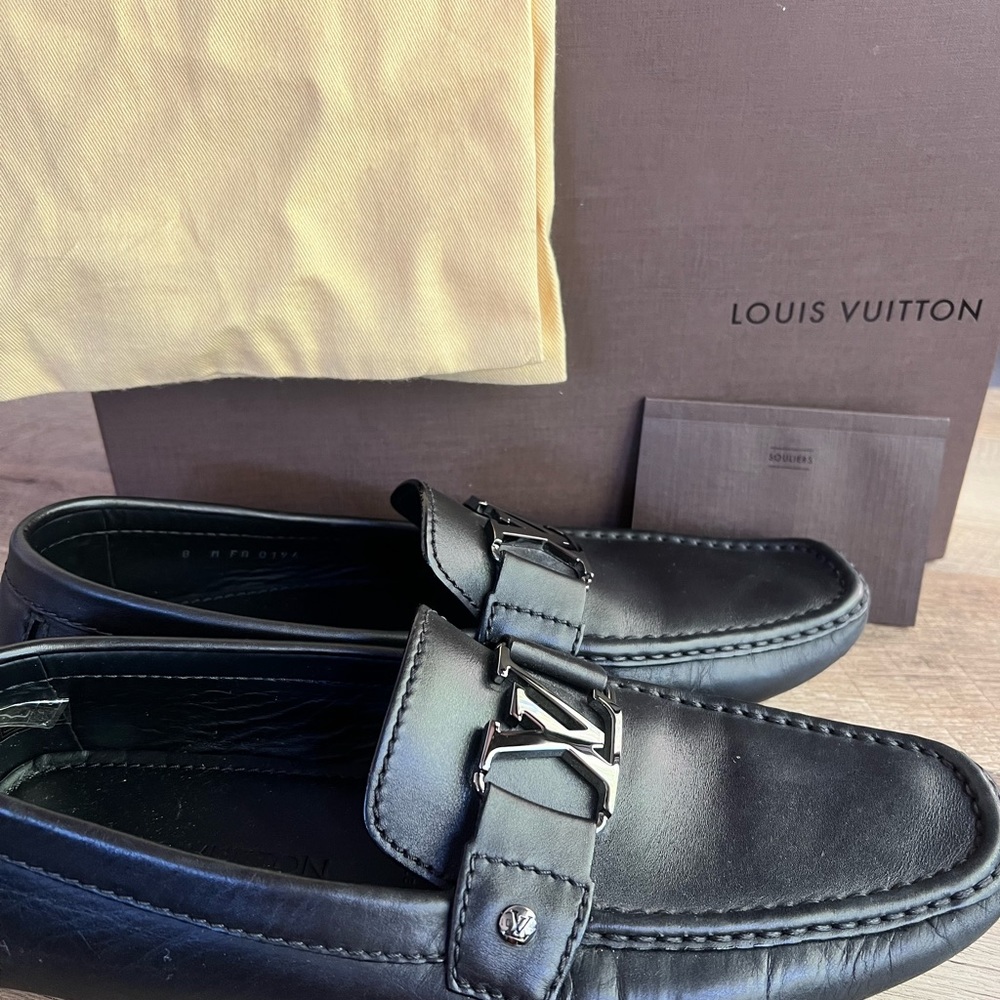 Louis Vuitton black loafers. With original box and individual shoe bags. Size 9